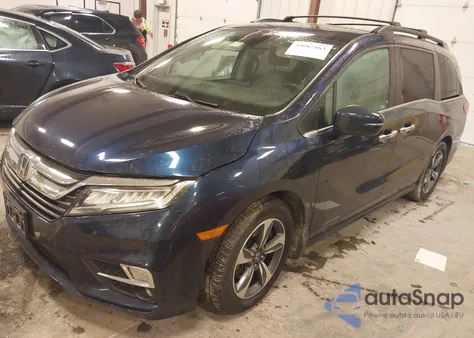 2019 Honda Odyssey Touring z USA, uszkodzony, nr VIN 5FNRL6H82KB027149